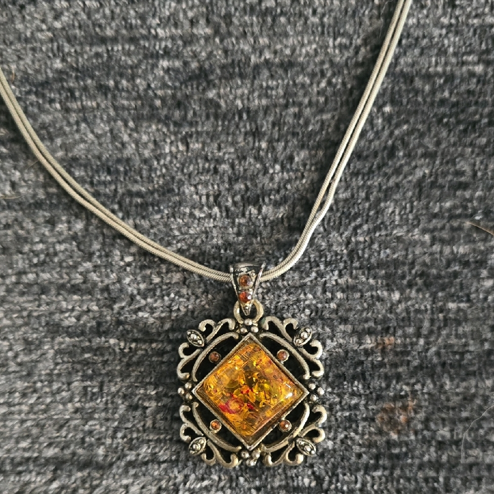 Elegant Silver Necklace with Amber Pendant